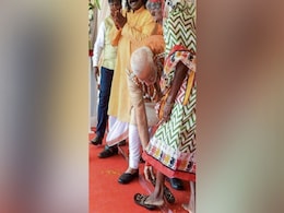 PM Modi's Picture Perfect Moment With Slippers For Tribal Woman At Rally PM Modi's Picture Perfect Moment With Slippers For Tribal Woman At Rally
