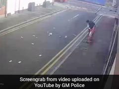 Wind Blows Away Robber's Stolen Cash, He Helplessly Chases After. Watch