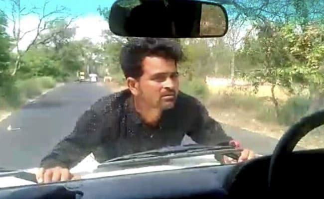Watch: UP Government Official Drives For 4 Km As Man Clings On To Bonnet