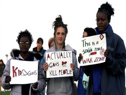 Students Walk Out Of Class To Demand Tighter US Gun Laws Students Walk Out Of Class To Demand Tighter US Gun Laws