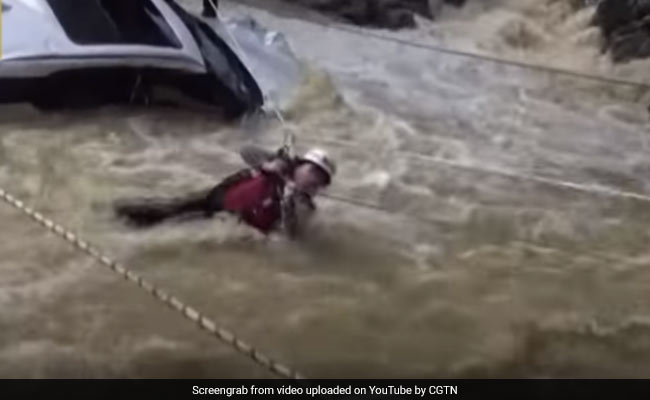 She Was Trapped In Her Car In A Flooded River. Watch Dramatic Rescue