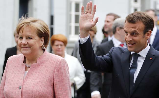 Angela Merkel, Emmanuel Macron Urge Iran And Israel To Exercise Restraint