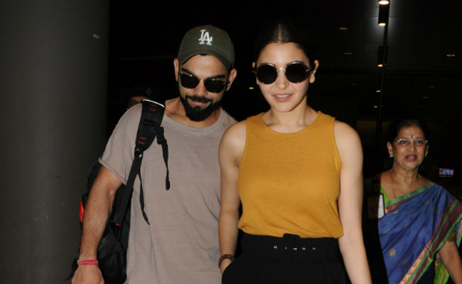 Anushka Sharma And Virat Kohli Return To Mumbai With Big Smiles