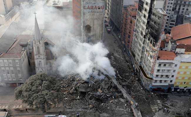 1 Dead, 3 Missing As Blazing Building Crashes In Brazil