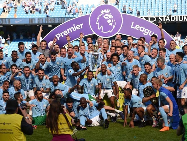 Manchester City Lift Premier League Trophy As Huddersfield Gain Precious Point