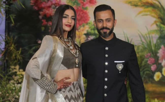 Sonam Kapoor And Anand Ahuja (In Sneakers) At Their Wedding Reception