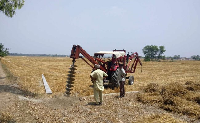 up tractor in field 650