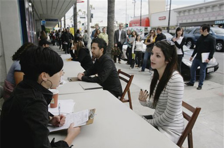 Recession-hit UK cuts jobs for migrants