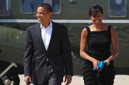 Obama keeps promise, takes wife to Broadway show