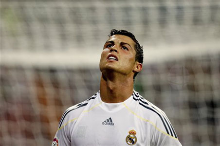 Ronaldo at the double as Real secure nervy win