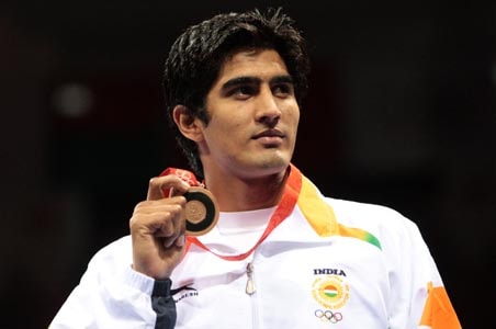 Dinesh ousted, Vijender lone Indian hope in World C'ships