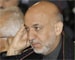 Karzai accepts Afghan runoff, instability lingers