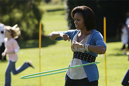 Michelle Obama hula hoops for health