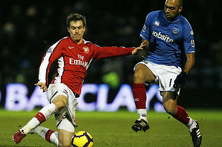 Arsenal turn on the style to rout sorry Portsmouth