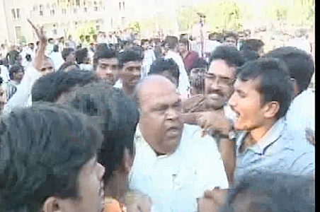 TDP leader Janardhan Reddy beaten with chappals at Osmania