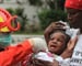 Officials work to speed aid to devastated Haitians