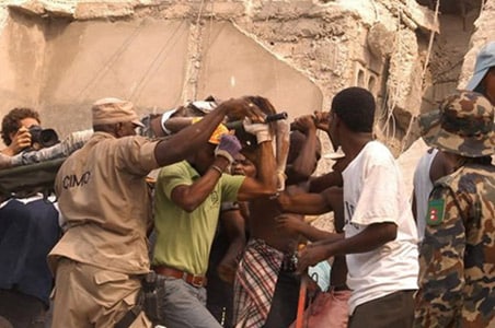 Officials work to speed aid to devastated Haitians