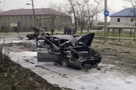 Suicide blasts in southern Russia kill 12 