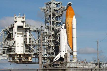 Space shuttle Discovery fuels for pre-dawn launch