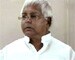 Lalu says Ramdev 'senile', cheating people