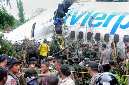 Passenger plane skids off runway in Indonesia