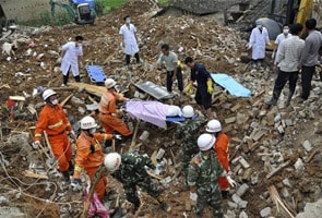 Rescuers search for 107 in China landslide