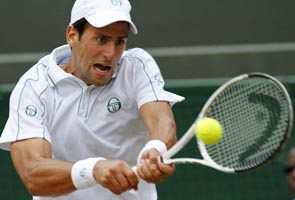 Djokovic surges into Wimbledon fourth round 