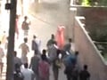 Stray bullet kills woman, curfew in tense Srinagar