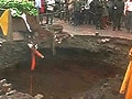 Central Mumbai road caves in with 20-foot hole