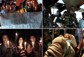 Candle light march in Leh for cloudburst victims