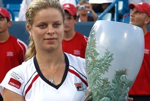 Clijsters rallies to beat Sharapova for WTA title