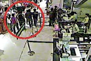 Caught on camera, youngsters on shopping spree with stolen card