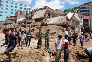 Landslides kill scores in Northern China