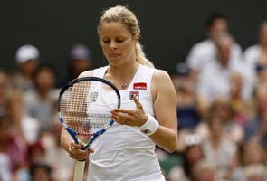 Injury sends tearful Ivanovic off, Clijsters into final
