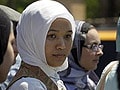 Muslim Disneyland employee says she was forced to remove head scarf