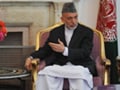 Key Karzai aide in corruption inquiry is linked to CIA