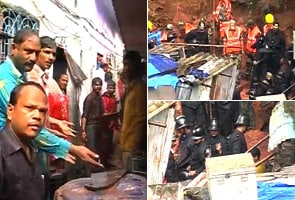 Three people feared trapped in landslide in Mumbai
