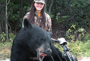 Teen with bow and arrow kills 448-pound bear