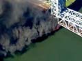 Fire under NY bridge halts train for hours