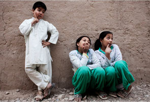 In Afghanistan, boys are prized and girls live the part