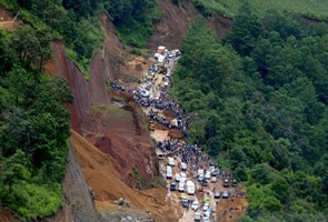 Guatemala mudslides kill at least 38; 2 buses hit