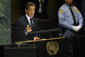 Sarkozy calls for global finance tax to help poor 