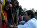 Rahul Gandhi breaks security cordon to meet children