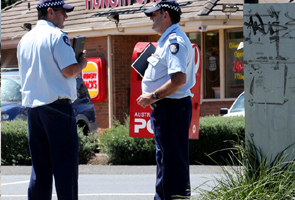 Australia sacks four police officers for racist emails