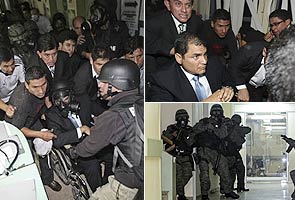 Ecuador troops rescue president from rebel cops