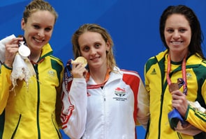 Halsall gives England first swimming gold 