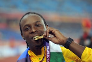 clarke jamaica men 100m medal wins gold lerone delhi usain absence bolt storm commonwealth most games made