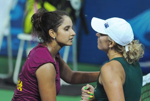 Sania gets silver, Paes-Bhupathi bronze