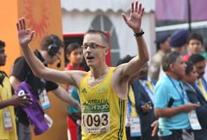 Husband and wife take walk medals, Games in race row