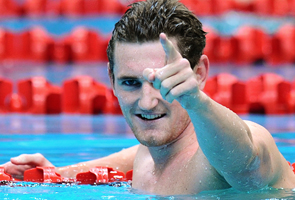 Van Der Burgh doubles up with 50m breaststroke gold  